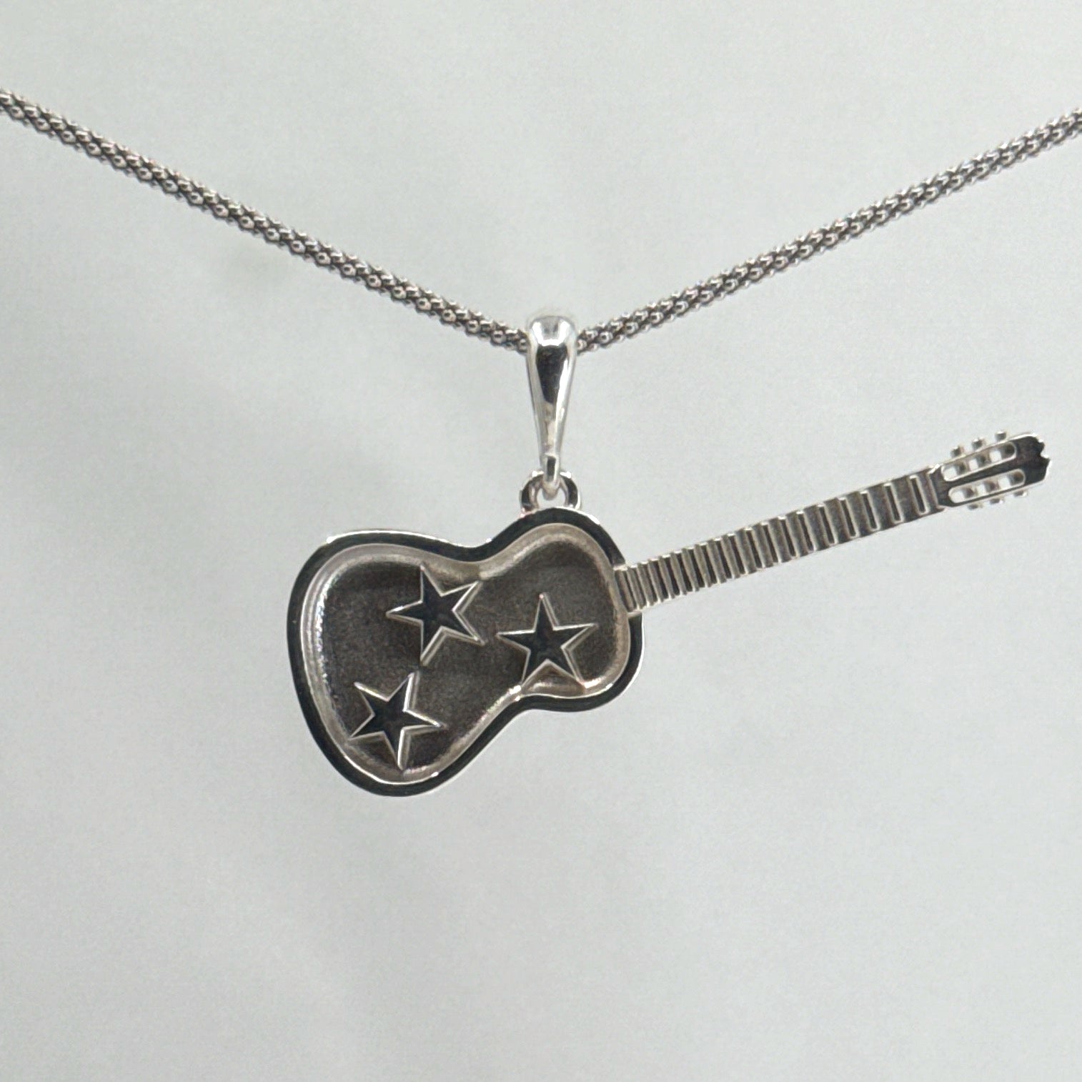Sterling Silver Tri-Star Guitar Pendant – Honoring Tennessee’s Musical Soul